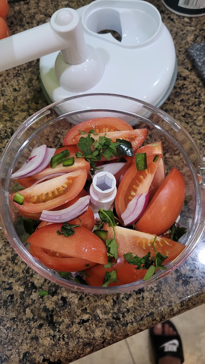 Place inside a salsa chopper in small quantities.