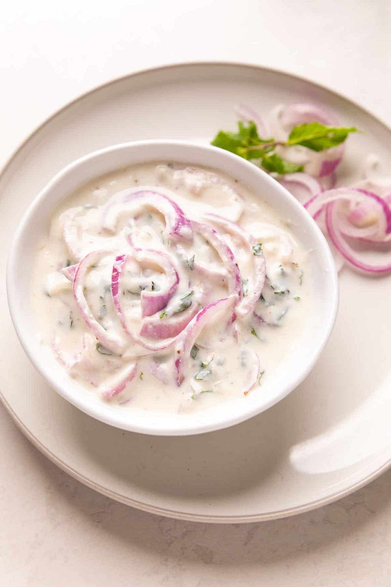 Whisk yoghurt in a bowl. Add all ingredients and mix well.