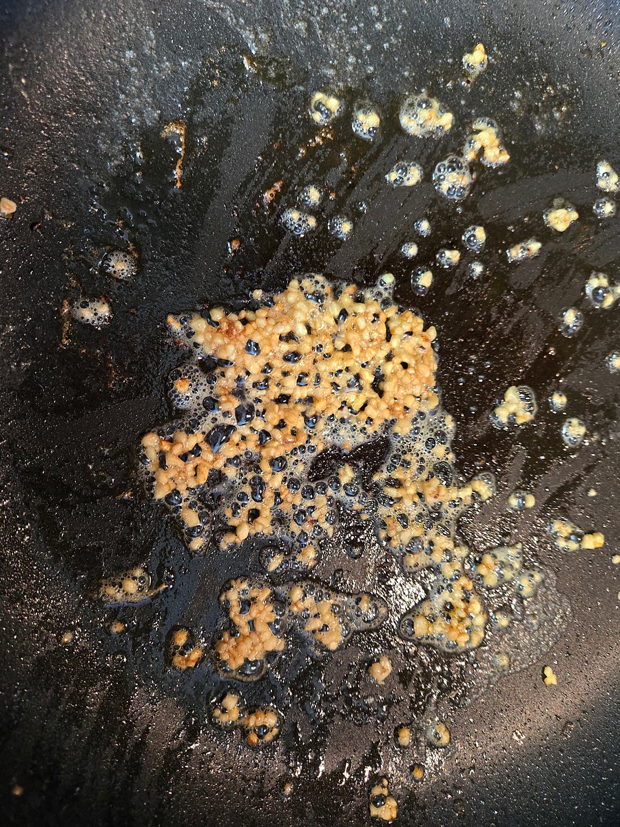In the same pan you used to sear the roast saute half a diced onion, and a chopped clove of garlic in a tablespoon of butter, and then add to Crockpot.