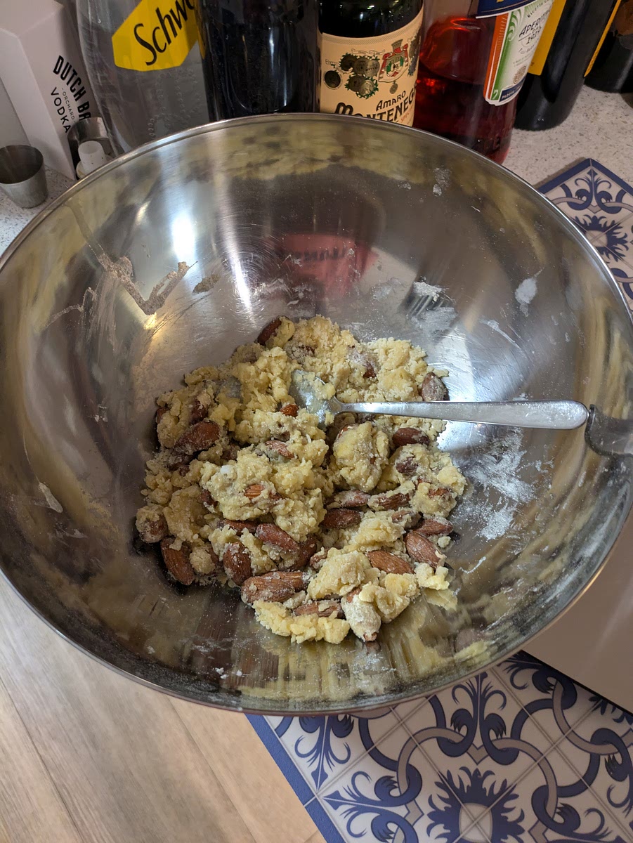 Mix the eggs with the sugar in a bowl, then add all ingredients and mix, first with a spoon and then with hands.