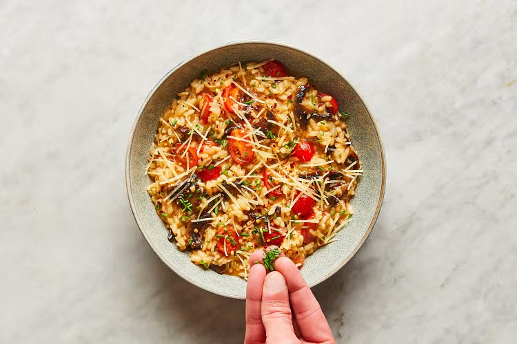• Divide risotto between bowls. Top with remaining chives and remaining Parmesan. Sprinkle with a pinch of chili flakes to taste. Serve. Top risotto with shrimp or chicken. Chicken is fully cooked when internal temperature reaches 165°.