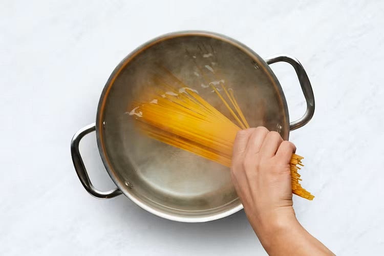 • Bring a large pot of salted water to a boil. Once water is boiling, add spaghetti to pot. Cook, stirring occasionally, until al dente, 9-11 minutes. • Reserve 1⁄2 cup pasta cooking water (1 cup for 4 servings), then drain.