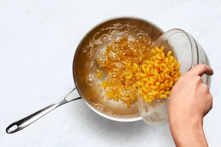 • Once water is boiling, add cavatappi to pot. Cook, stirring occasionally, until al dente, 9-11 minutes. Drain.