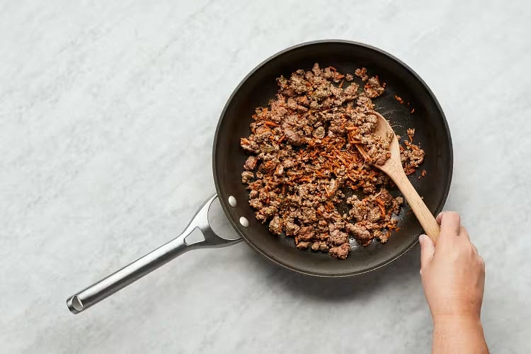 • Increase heat under pan with carrot to medium high and add a drizzle of oil. Push carrot to one side of pan. • Add beef* to empty side. Cook, breaking up meat into pieces, until browned, 4-6 minutes. Sprinkle with Italian Seasoning. Cook, stirring, until beef is cooked through, 4-6 minutes. Season generously with salt and pepper. • Stir carrot and beef to combine.