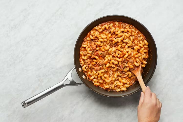 • Stir in marinara and 1/3 cup water (1⁄2 cup for 4 servings). Reduce to a simmer and cook until sauce has slightly thickened, 3-4 minutes. Reduce heat to low. • Stir in cream cheese until thoroughly combined. • Add drained cavatappi, half the chopped parsley, and 1 TBSP butter (2 TBSP for 4); stir until pasta is warmed through, 1-2 minutes. (For 4, if pan is too small, carefully transfer everything to pot used for pasta.) Season with salt and pepper.