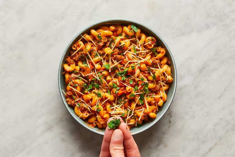 • Divide pasta between plates or bowls. Top with Parmesan and remaining chopped parsley. Serve.
Ground Beef is fully cooked when internal temperature reaches 160°.