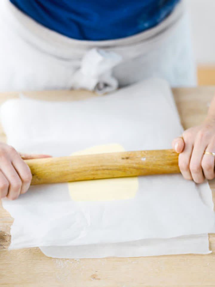 Remove the dough from the fridge and roll it out on a floured surface to 16cm x 30cm – a little wider than the butter block.