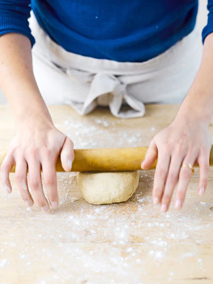 Place the butter on one half of the pastry, then fold over the other half to cover it, pressing the edges together to seal, and roll back out to 16cm x 30cm. Keep flouring the surface to stop the puff pastry sticking