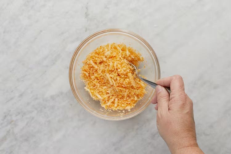 • Place 1 TBSP butter (2 TBSP for 4 servings) in a medium microwave-safe bowl; microwave until melted, 30-45 seconds. • Stir in panko, Monterey Jack, remaining Frank’s Seasoning Blend, and a big pinch of salt and pepper.