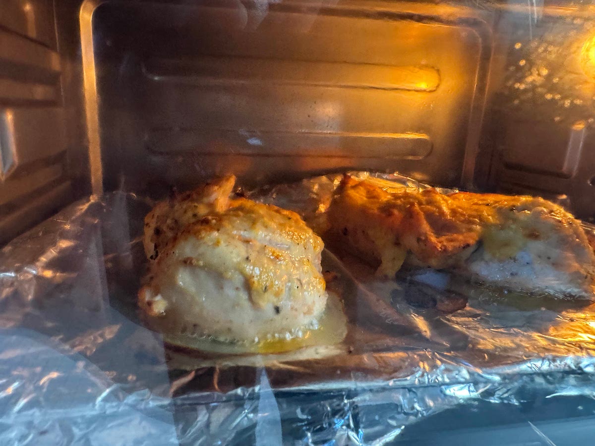 Cook chicken at 375°F for 30 mins, or until internal temperture of chicken reaches at least 165°F.