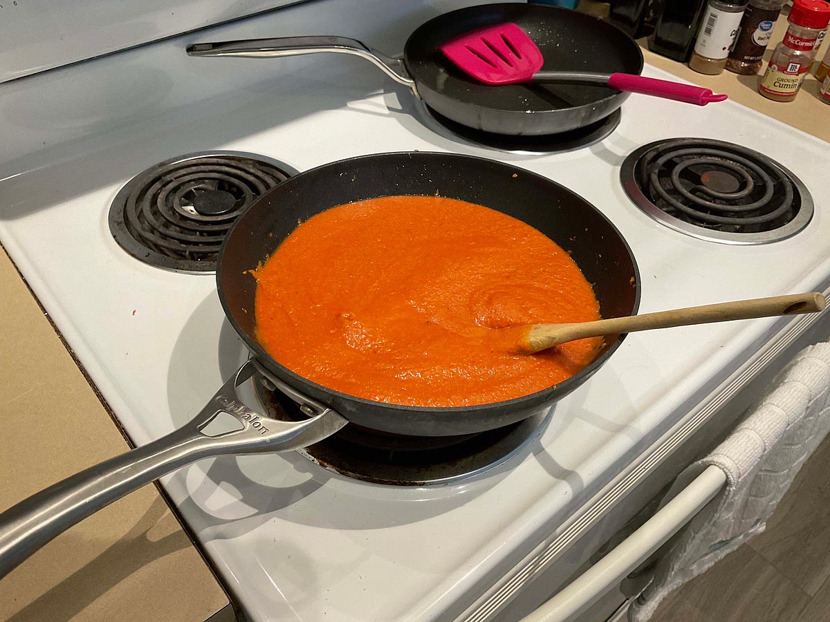 Add the purée to the wok and let it simmer on high heat for 3-4 minutes (turn the heat down if it starts to boil)
— if you have a lid that fits your wok, no need to turn down the heat