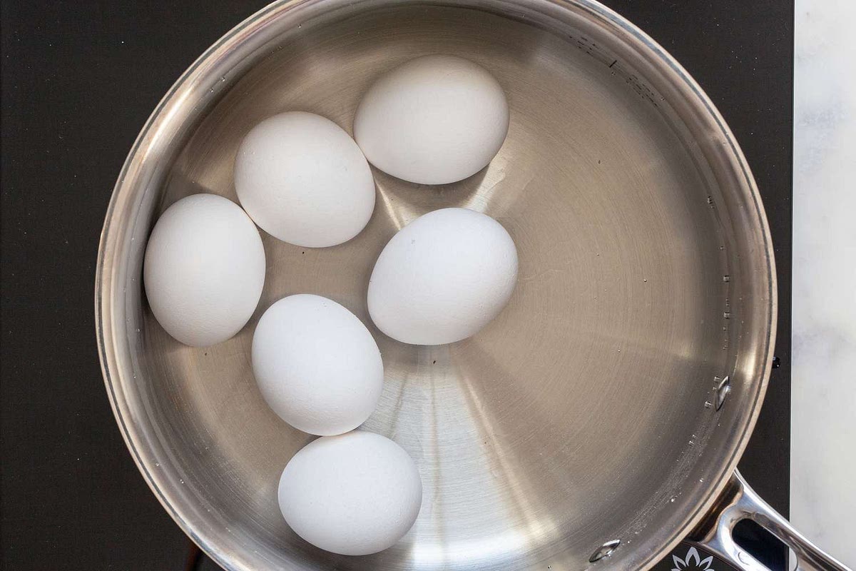 - Afterward, transfer the eggs to a bowl of ice water to cool for about 5 minutes.