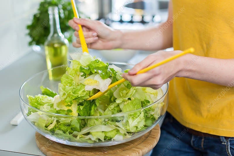 In a large bowl, combine the chopped eggs, mayonnaise, Dijon mustard, chopped celery, chopped red onion, and fresh chives (if using).