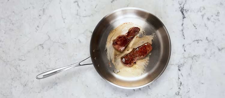While potatoes roast, pat steak dry with paper towels; season all over with salt and pepper. Heat a drizzle of oil in a large pan over medium-high heat. Add steak and cook to desired doneness, 3-5 minutes per side. Turn off heat; transfer to a cutting board. Tent with foil to keep warm.
