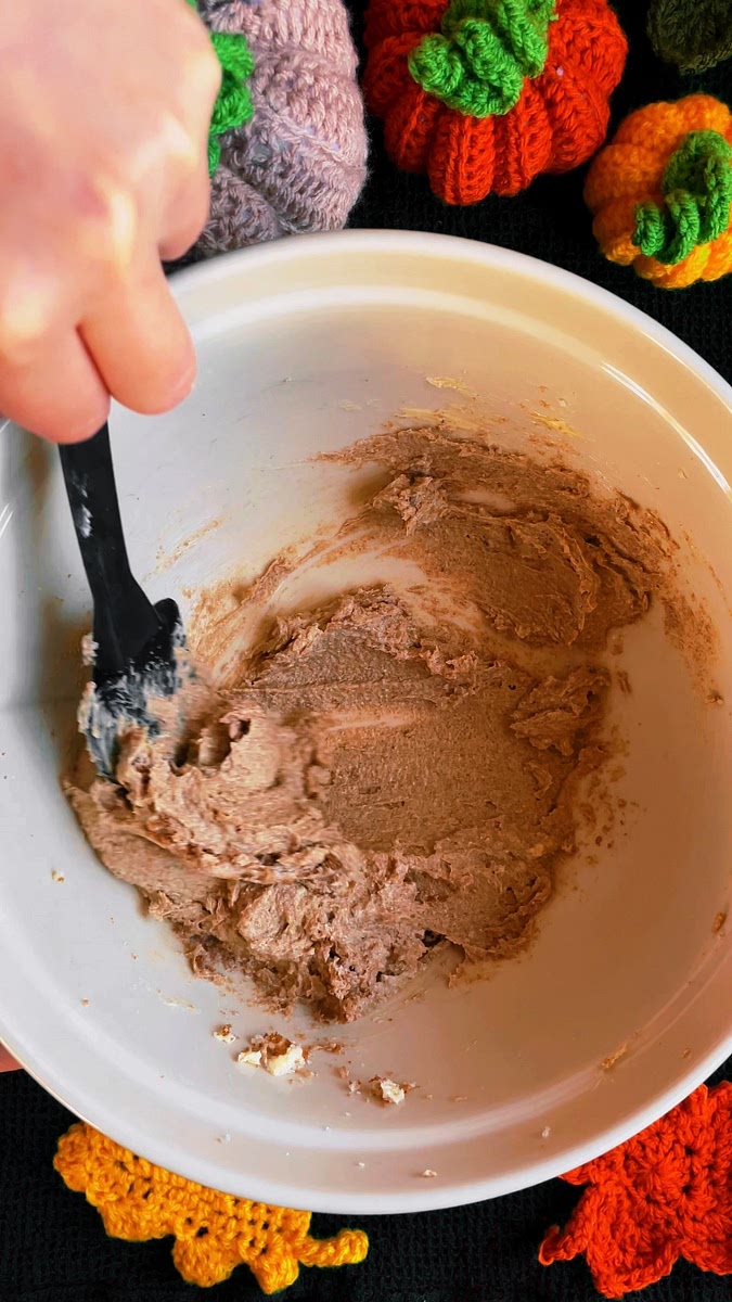 Mix the softened butter with the white and brown sugars until you get a smooth consistency.