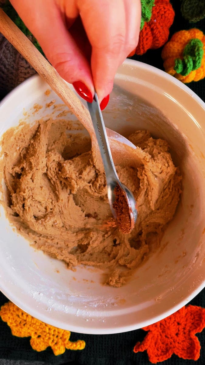 Add the bicarbonate of soda, salt and sift in the flour. Mix using a wooden spoon until all the flour is fully incorporated. Lastly, add the mixed spice and mix in well (you can use cinnamon instead or completely skip this step).