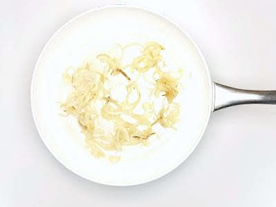 While the rice is cooking, peel and finely slice your brown onion[s] Peel (scrape the skin off with a teaspoon) and finely chop (or grate) your ginger Heat a large, wide-based pan (preferably non-stick) with a drizzle of vegetable oil over a high heat Once hot, add the sliced onion with a pinch of salt and cook for 2-3 min or until starting to soften