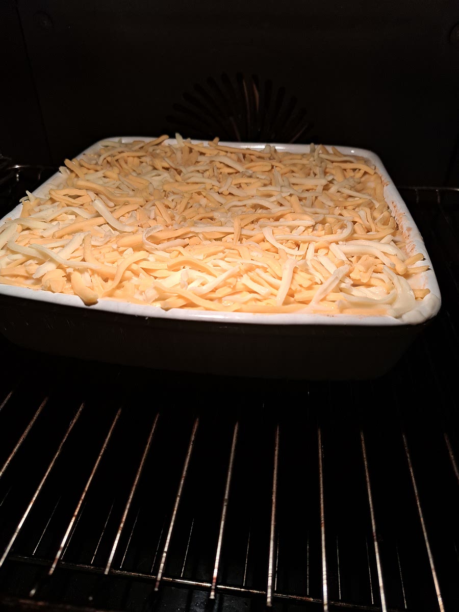 Set the oven to 180°C/160°C Fan/356°F. Put the lasagna into the preheated oven and bake for 45-60 minutes. Once the cheese is melted and crispy, and the sides are bubbling, it should be done!