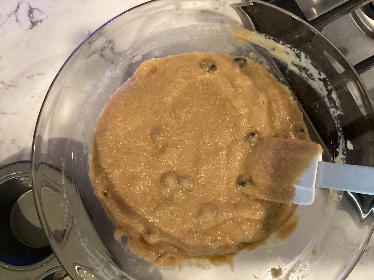 In a large mixing bowl, add the protein powder, almond flour, and baking powder, and mix well. Add the peanut butter and unsweetened applesauce and mix until fully combined. Fold through your chocolate chips.