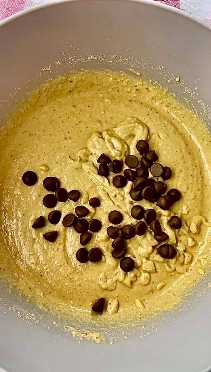 Add biscuits to a food processor and process to crumbs then add them to a bowl with baking powder whisk and add milk and chocolate chips and mix until smooth . (You can also use any other crumbly biscuits and use a ziplock bag and rolling pin to break them up if you don’t have a food processor and biscoff biscuits )