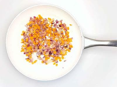 Heat a large, wide-based pan (preferably non-stick) with a drizzle of olive oil over a medium heat Once hot, add the chopped onion, diced carrot and chopped garlic and cook for 3-4 min or until beginning to soften Meanwhile, dissolve the beef stock mix and tomato paste in 250ml (adjust for more people) boiled water and stir in your Marmite – this is your tomato stock