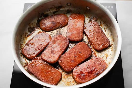 Remove the Spam from the pan and let it rest for about 5 minutes to cool down.