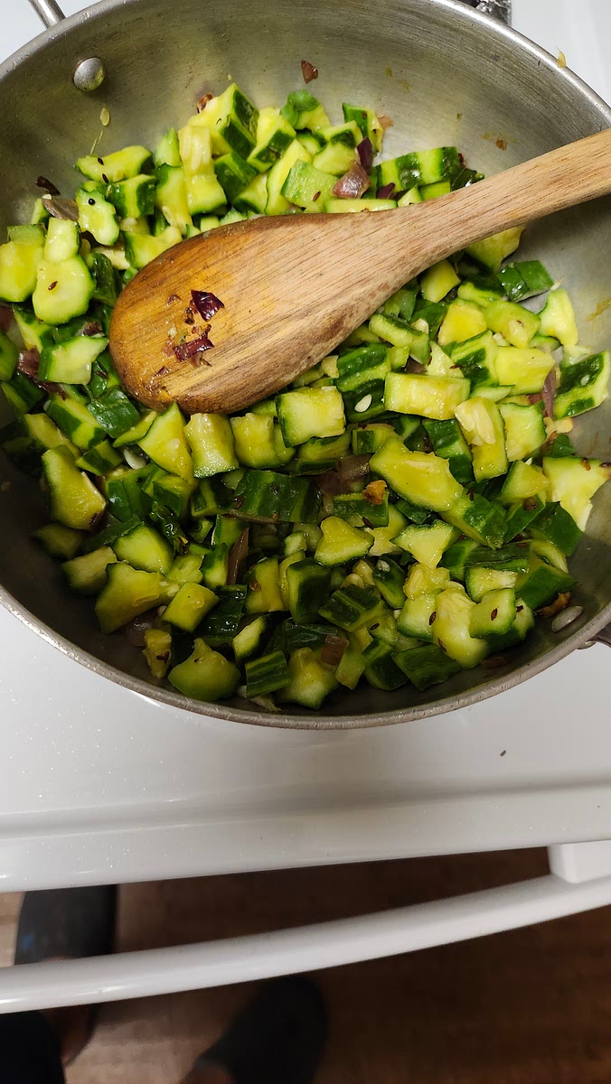 Add turya & mix it , cover it & cook it for 15 min