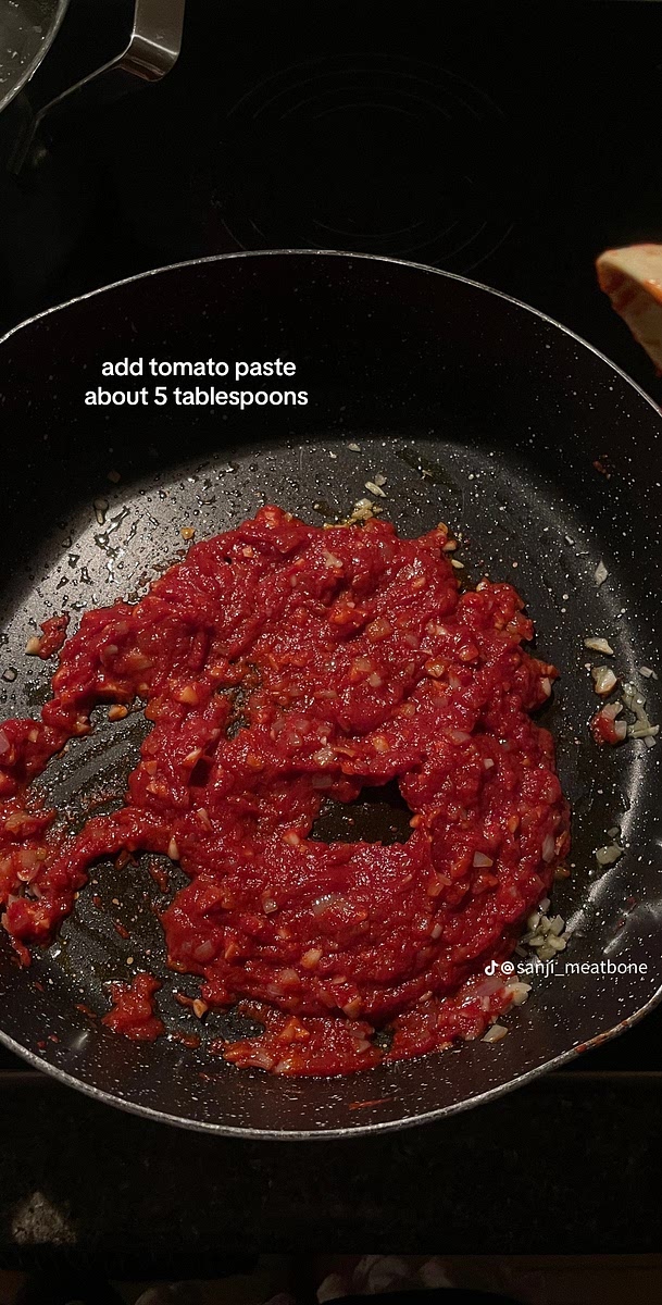 Add tomato paste (about 5 tablespoons)