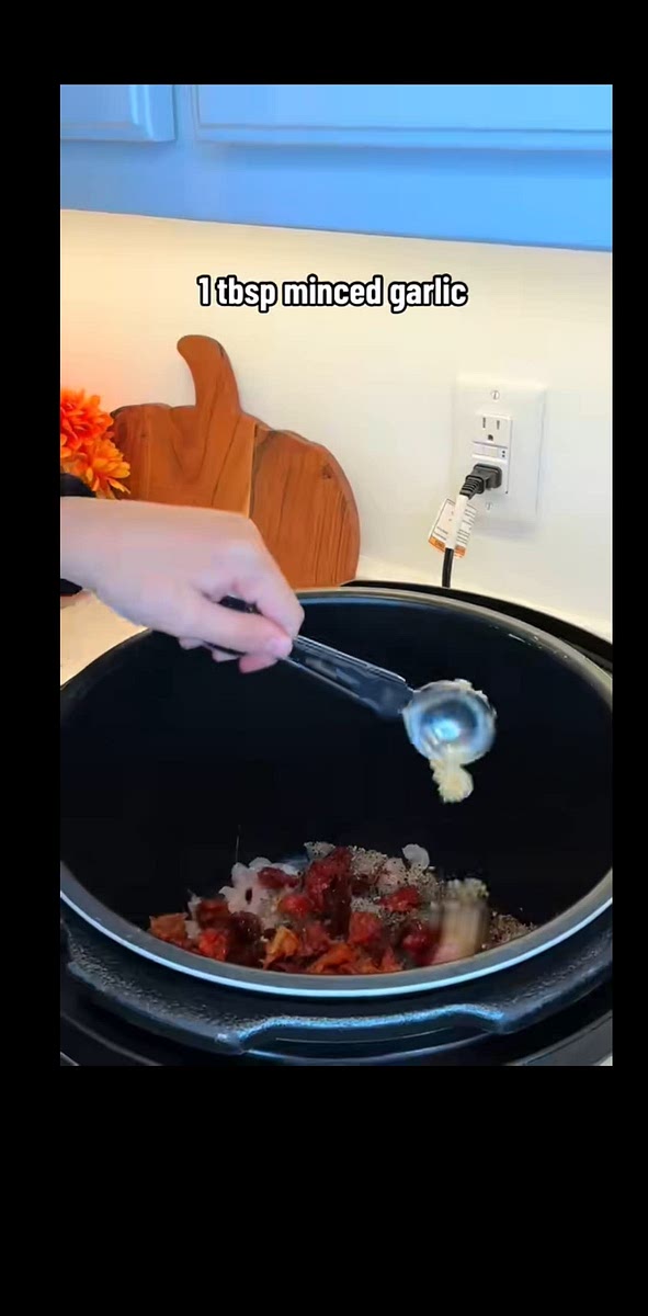 Add the minced garlic, diced onion, and tomatoes