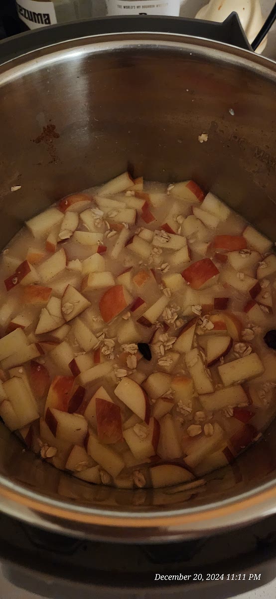 Lightly grease your slow cooker with cooking spray or butter. In the slow cooker, combine the oats, milk, cider, apples, cranberries, maple syrup, vanilla extract, cinnamon, salt, and 1 cup of water and stir to combine. Cover and cook on Low for 6-9 hours.