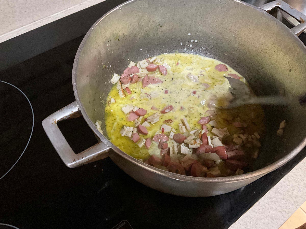Add in evaporated milk 1 can at a time (only use 1.5 can of milk)