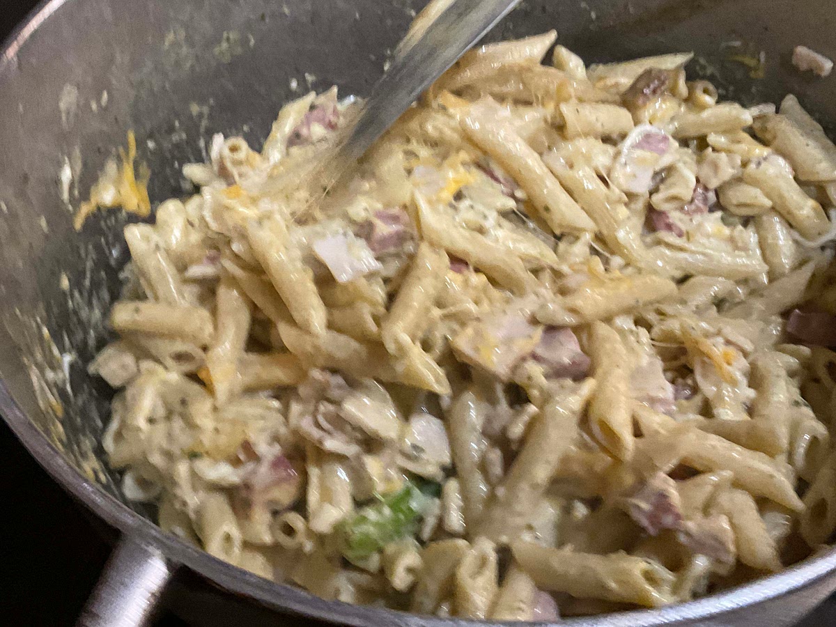 Add in 2 cups of each cheese