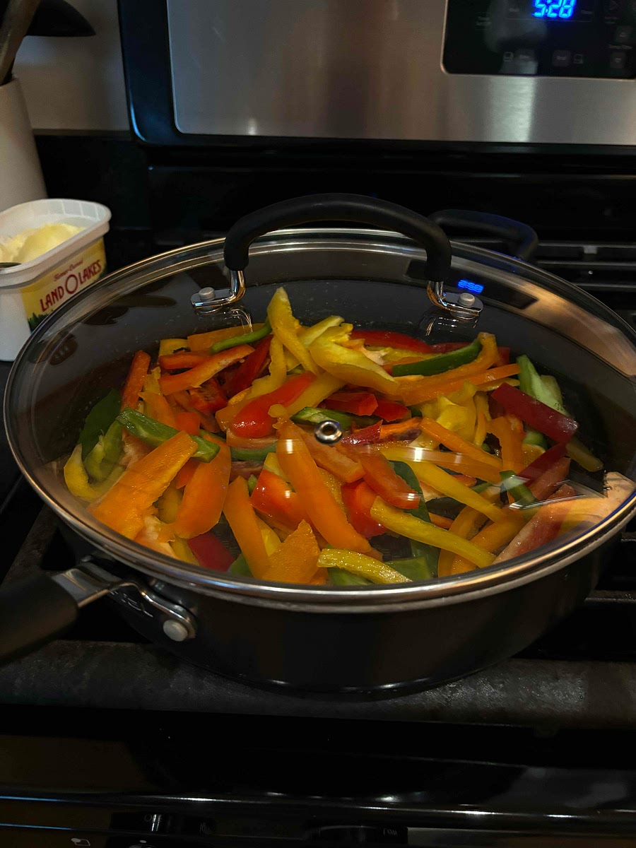 Repeat same steps with the peppers. Place a small amount of butter into same saucepan and coat peppers. Cook with lid on and stir occasionally. Cook for about 7-9 minutes until peppers are softened