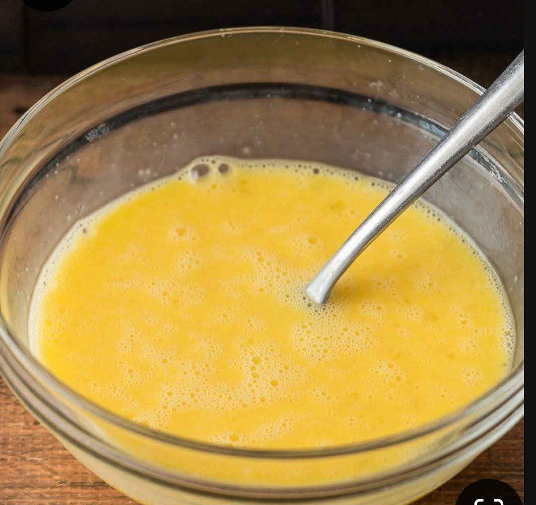 Now, take a separate bowl and beat up 2 eggs