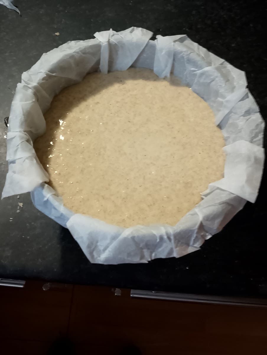 Verser dans un moule de 18 cm munis de papier cuisson.