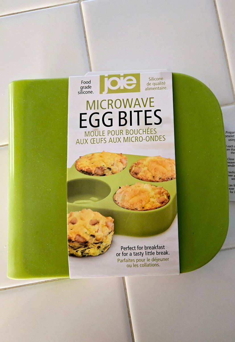 Pour egg mixture evenly into each of the 4 cups of the microwavable egg bites tray, filling them to halfway.