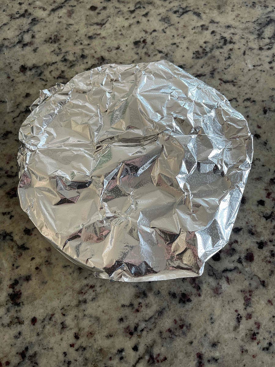 Cover the peppers with foil for 10 minutes.