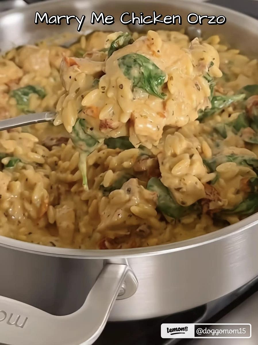1. In a large skillet over medium heat, add oil and let it get hot. Once shimmering, add chicken and brown.
2. Add in the drained sundried tomatoes, garlic, Italian seasoning, paprika, salt and pepper. Stir to combine and cook for about 2-3 minutes.
3. Stir in the orzo and chicken broth. Cover and simmer for 12 minutes or until orzo is cooked through, stirring occasionally.
4. Once orzo is cooked, add in spinach and heavy whipping cream and stir until spinach has wilted, then add in Parmesan cheese and stir once more.