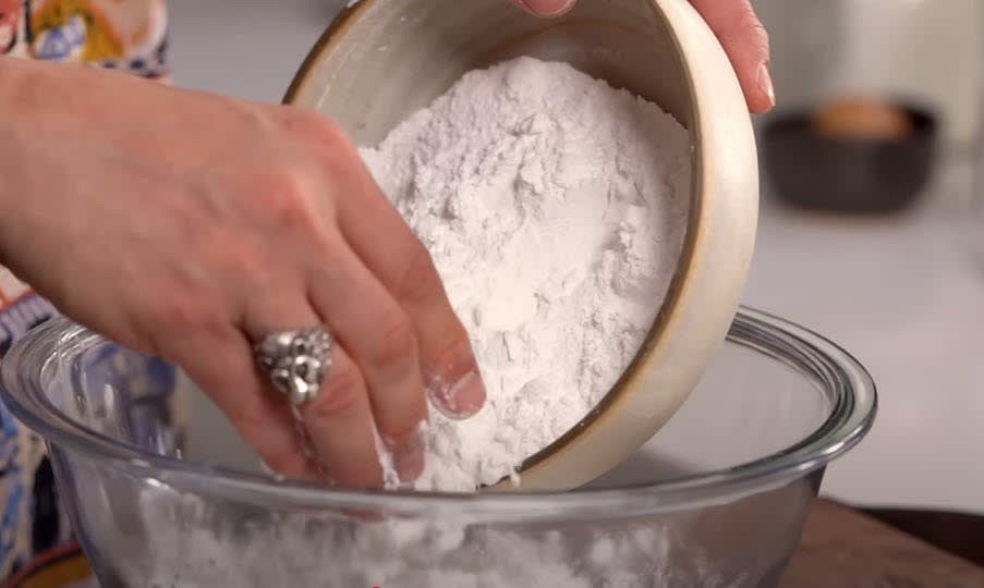 In a mixer bowl, combine the dry ingredients: tapioca flour and salt. Set aside.
