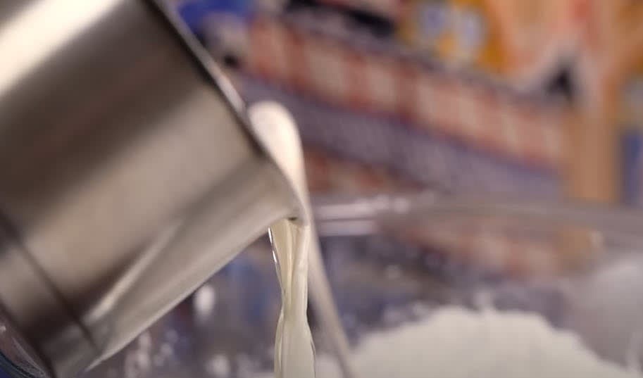 In a medium pan, add milk, oil, and butter, then bring to a boil. Keep an eye on the pan as it can overflow quickly.