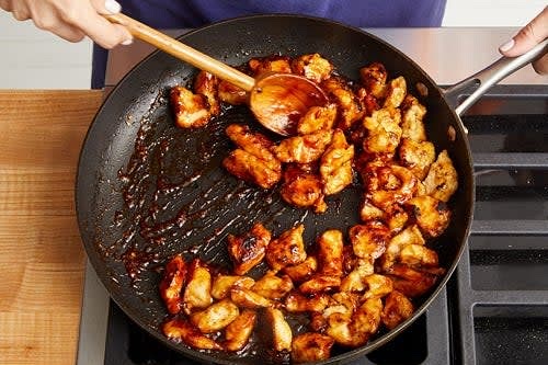 While the rice continues to cook, pat the chicken dry with paper towels; place in a large bowl. Season with salt and pepper. Add the cornstarch and stir to coat. In the same pan, heat 2 tablespoons of olive oil on medium-high until hot. Add the coated chicken in an even layer (shaking off any excess cornstarch before adding). Cook, without stirring, 3 to 4 minutes, or until lightly browned. Continue to cook, stirring frequently, 3 to 4 minutes, or until the chicken is browned and cooked through. Add the sauce (carefully, as the liquid may splatter). Cook, stirring occasionally, 1 to 2 minutes, or until the chicken is coated. Turn off the heat. Serve the cooked chicken and sauce with the cooked rice and finished vegetables. Garnish with the sesame seeds. Enjoy!