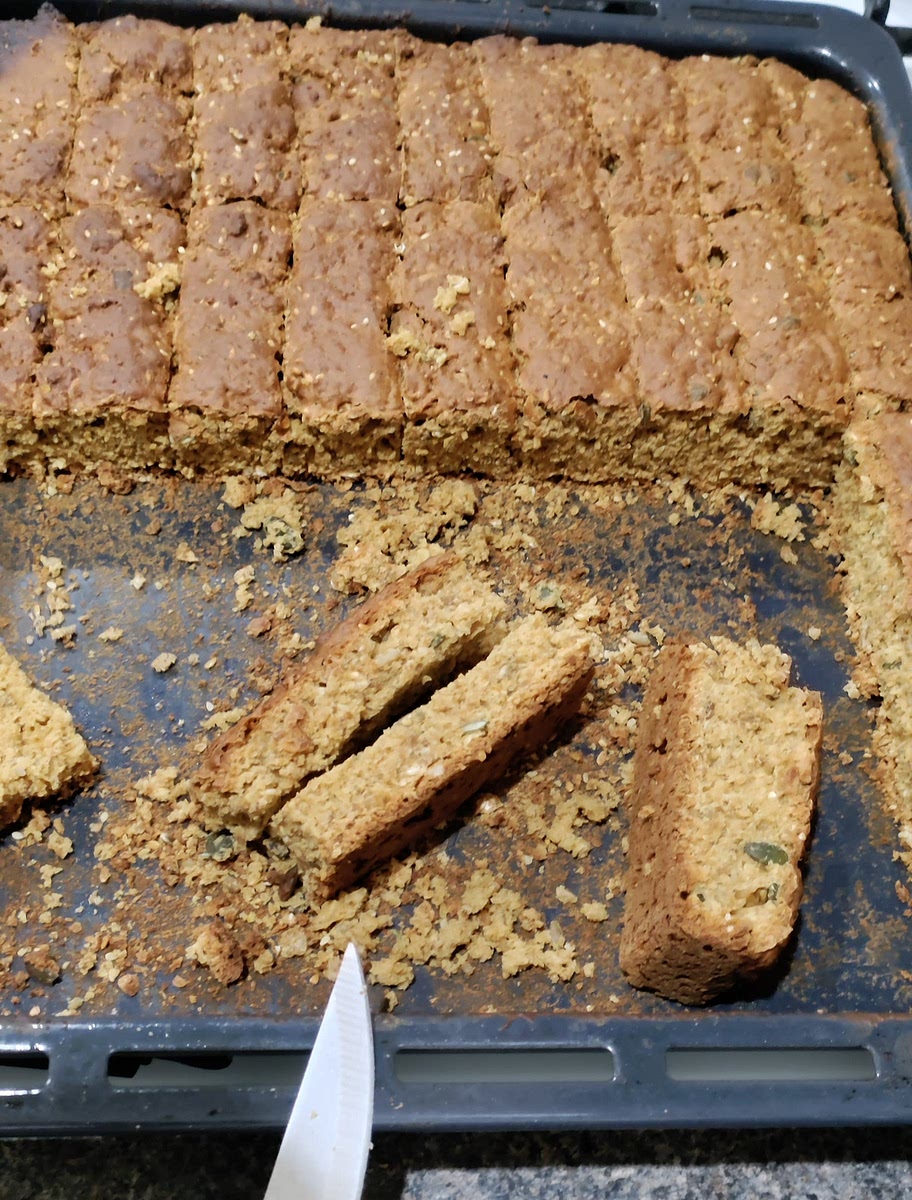Using a sharp knife cut through the rusks on the marked lines and place in the oven on the grill shelving. I did cut each block in half lengthwise again, as they were quite thick.