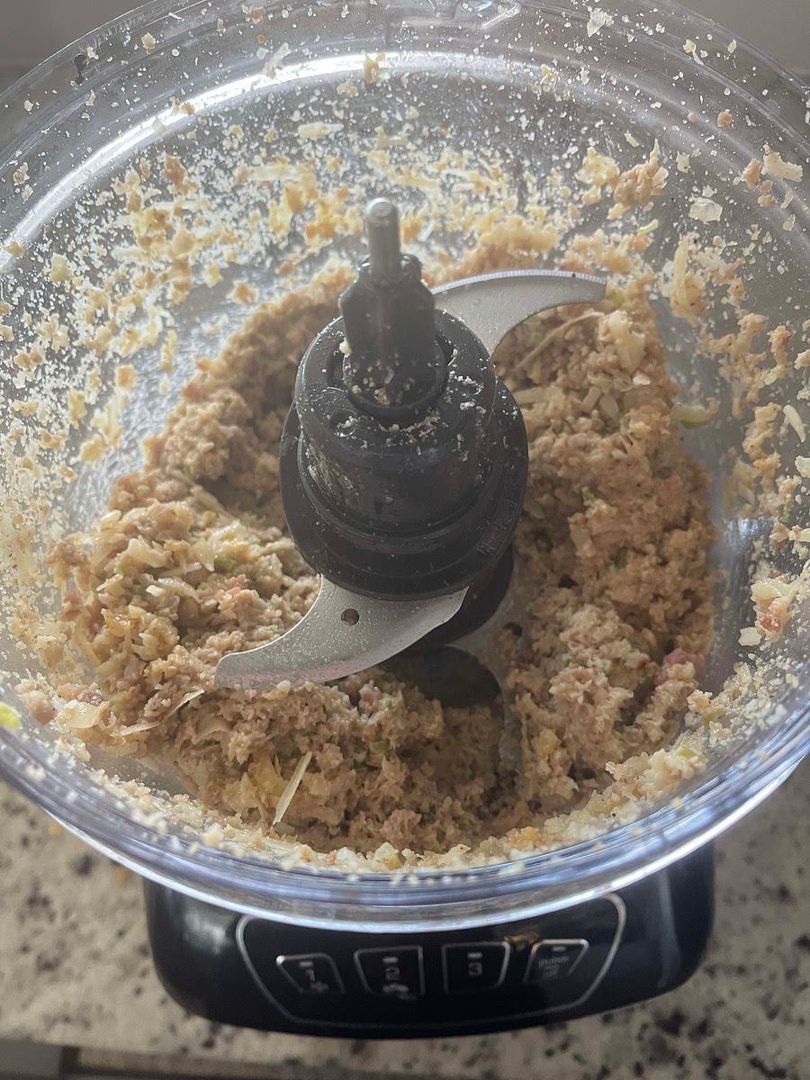 Transfer the filling mixture to a food processor. Add the egg, Parmesan cheese and breadcrumbs. Process until a rustic “paste” forms.