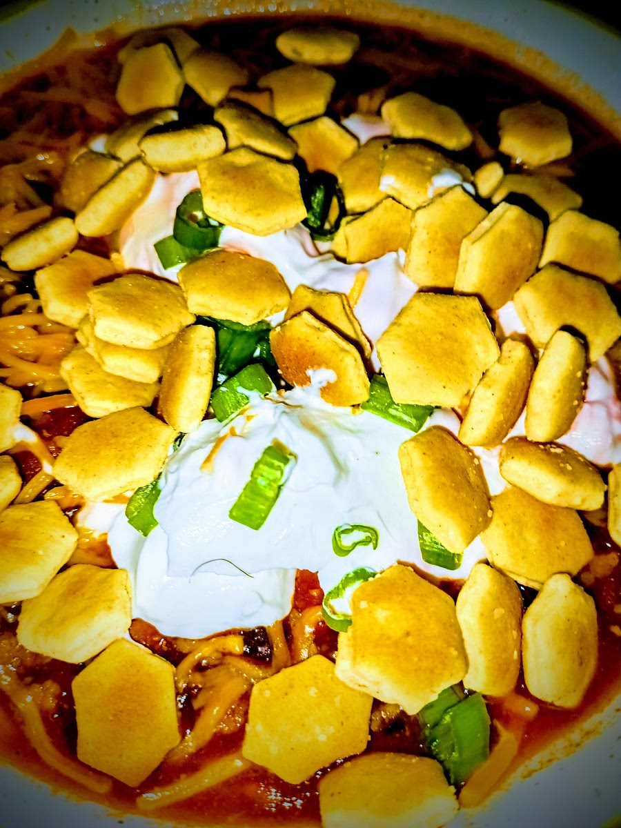 Serve with sharp cheddar, sour cream, green onions, and oyster crackers