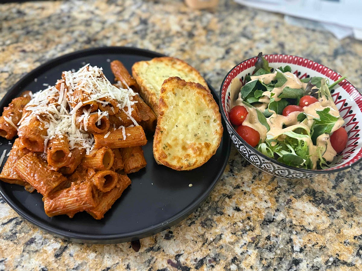 Garnish with basil and extra cheese