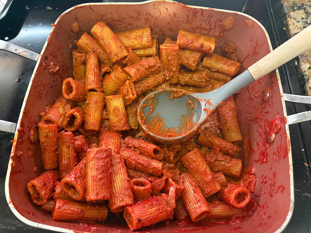 Toss in rigatoni, chorizo, and parmigiano-reggiano (add pasta water as needed)