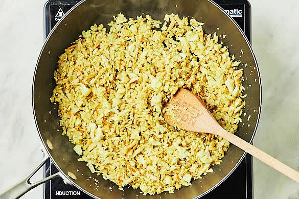 Cook the ‘rice’ Add 1 tbs olive oil to the almonds and increase the heat to high. Add the remaining kofta seasoning and cook, stirring, for 30 secs or until fragrant. Add the cauliflower and cook, stirring, for 3 mins or until tender. Remove the pan from the heat. Taste, then season with salt and pepper.