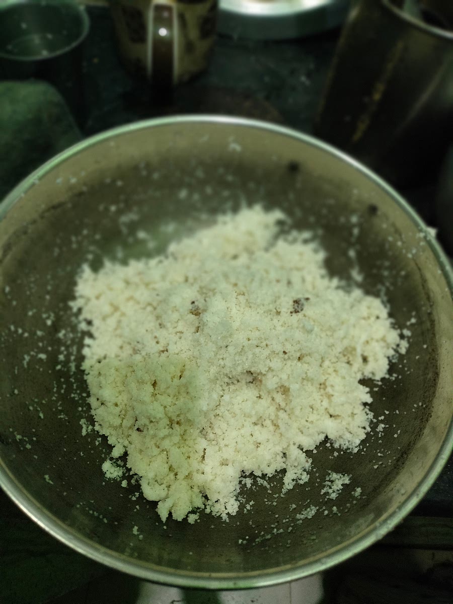 Mix while gradually sprinkling small amounts of water to maintain the desired texture.