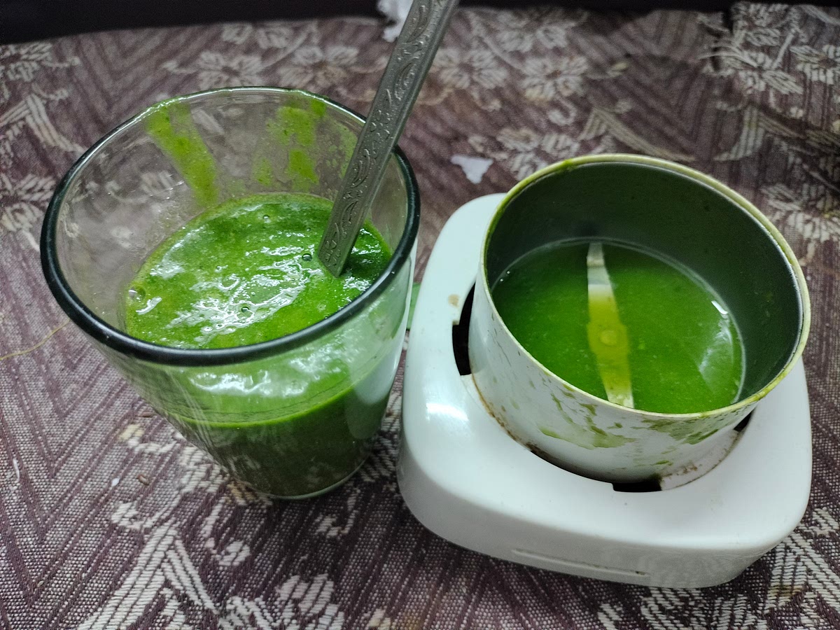 After you've blended the smoothie, pour it into a glass. Add a little more water to the blender, swirl it around, and pour that into your glass too.