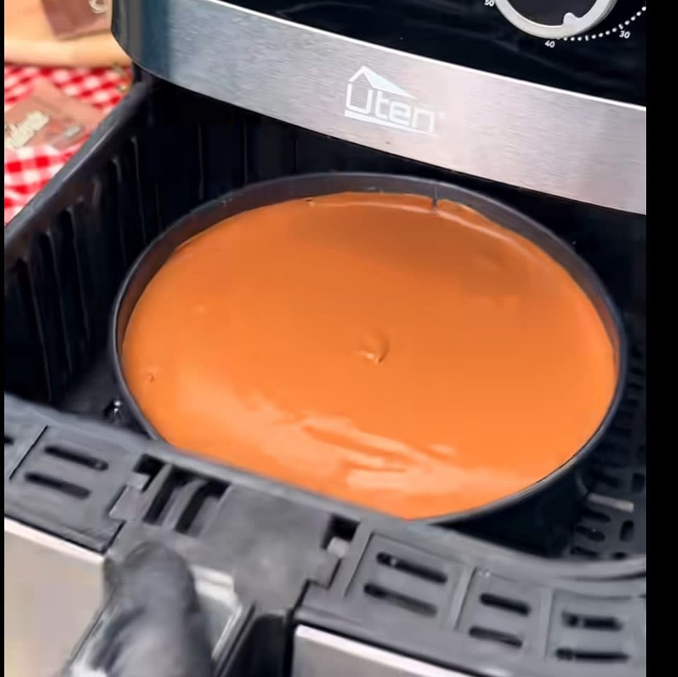 Transfer into previously lined mold and bake